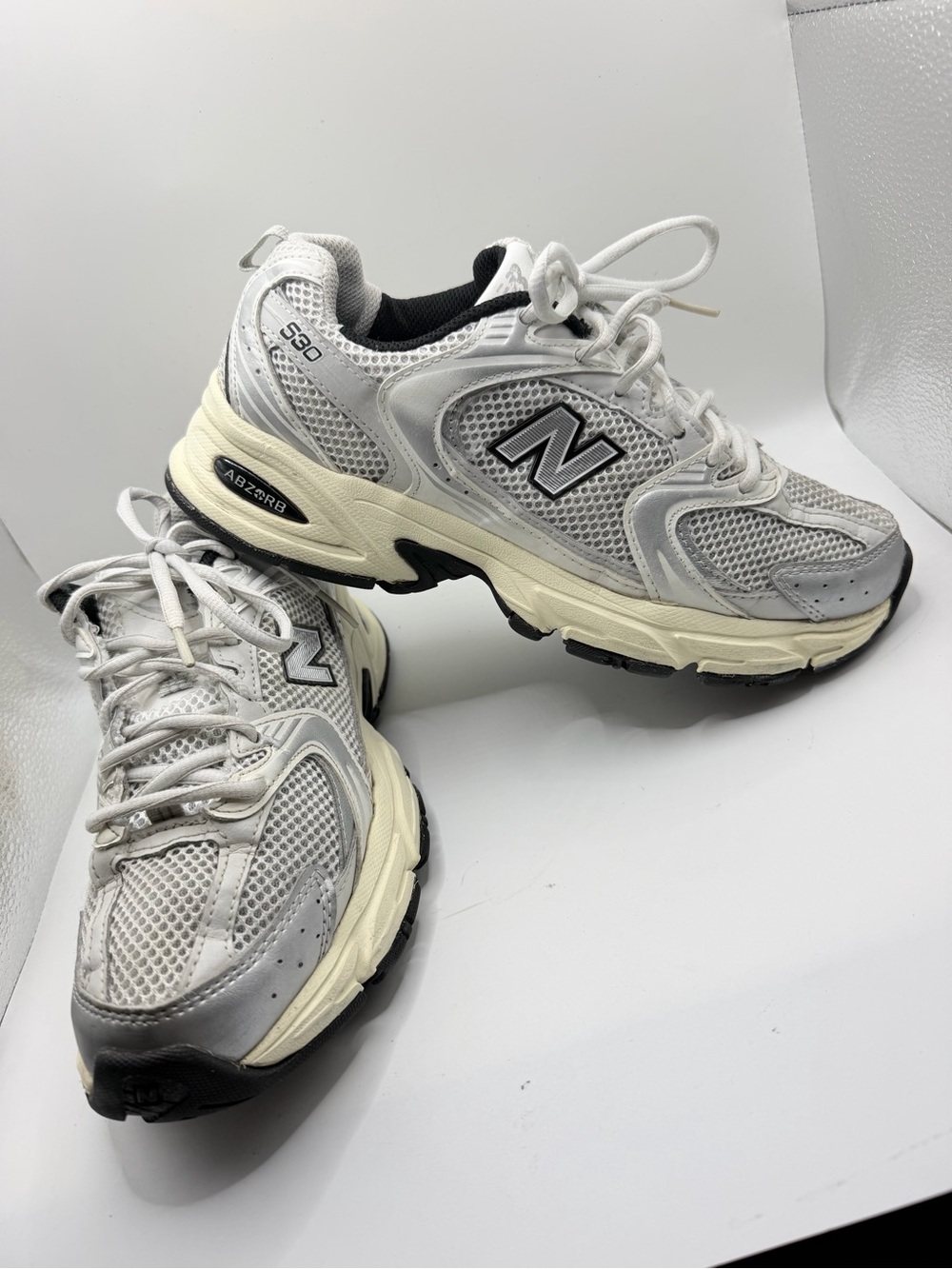 New Balance 530 Sneakers in White and Cream with Black Accents
